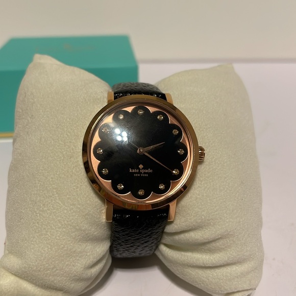 Kate Spade copper and black watch with black leather band works well NWT